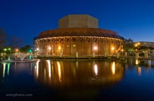 Texas State Theatre Center at night.