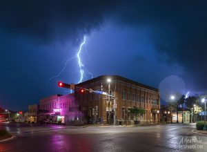 Lightning from an early morning storm strikes near downtown San Marcos.