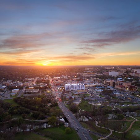 Twice a year, the setting sun lines up perfectly with Hopkins heading into downtown San Marcos.