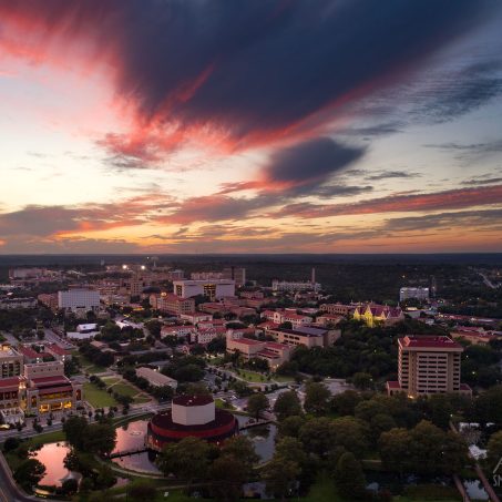 A colorful sunset over the Texas State University Campus.