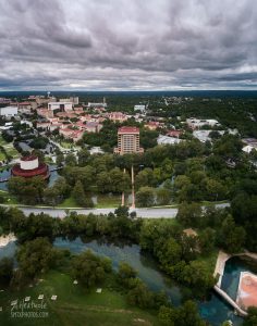 A cool and cloudy day over the San Marcos River and Texas State University.