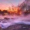 Winter sunrise through the steam on the San Marcos River at Rio Vista